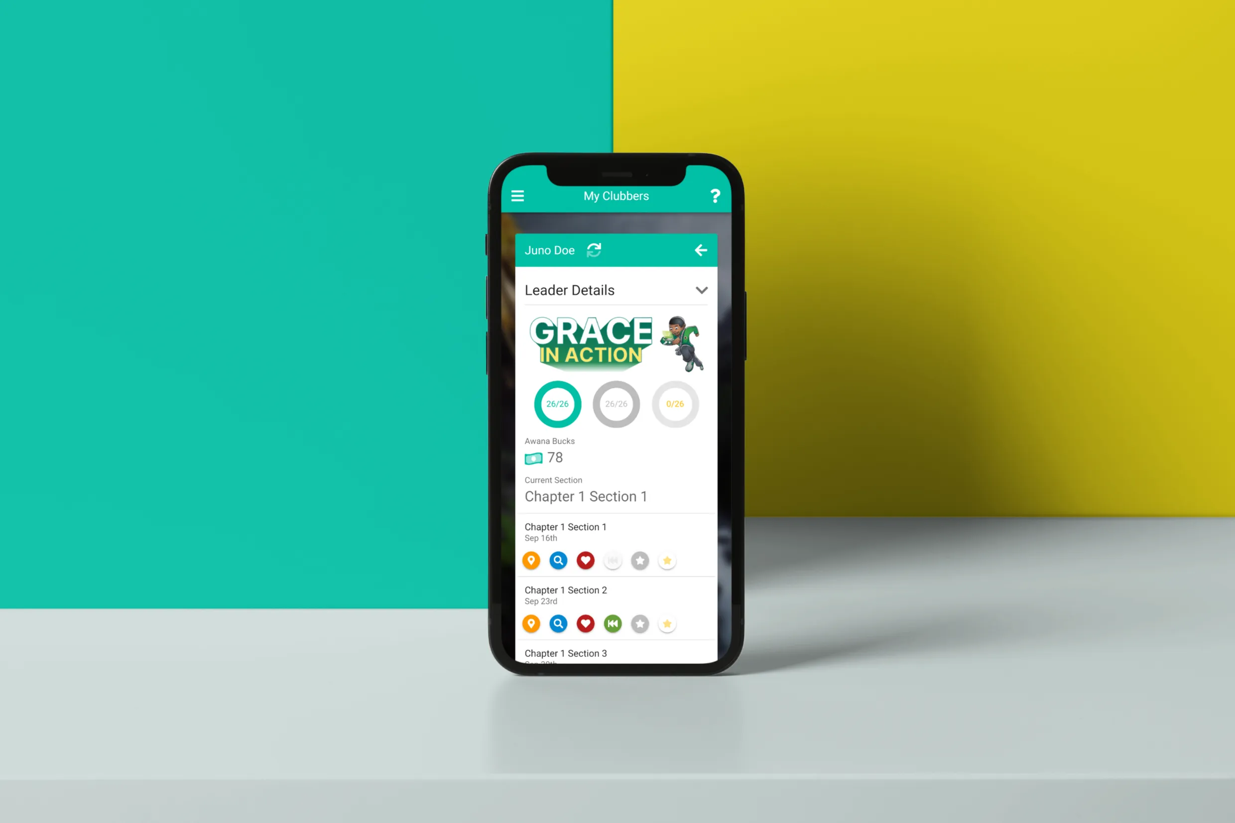 A smartphone with an app interface titled "My Clubbers" at the top. The screen shows leader details for "Juno Doe," featuring a badge "Grace in Action" and progress indicators. Below, there is a section breakdown with icons representing various achievements and milestones. The interface uses a teal and yellow background.